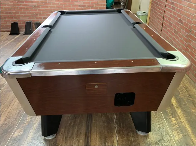 Pool table reassembled and leveled after a move